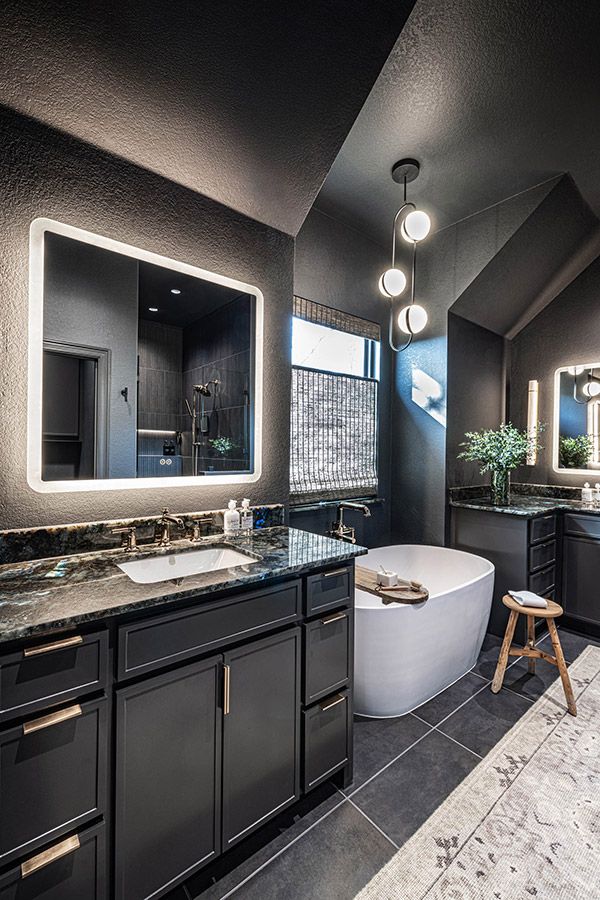 Creative lighting and spa tub in bathroom remodel by DRI Construction